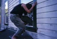 a person leaning out of a window
